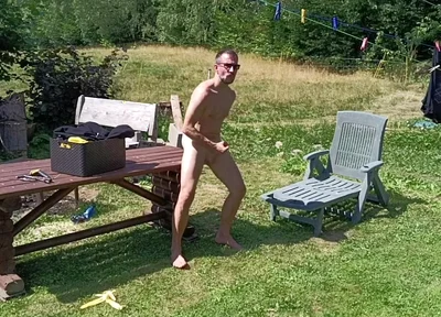 Jerking off While Hanging Out the Laundry