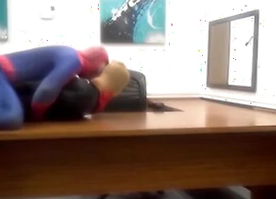 Spiderman Humps Robber He Finds In An Office
