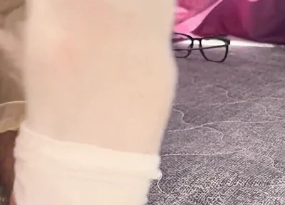 A University Rests Her Feet on Her Face so That the Adorers