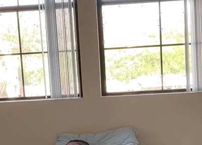Watching Him Drift Between Shirts and Shorts