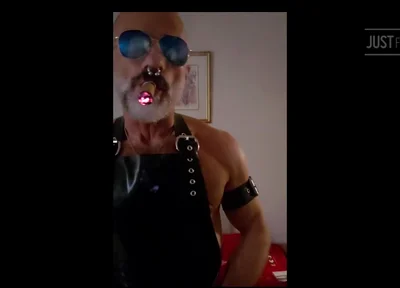 Stepdad lighting his Cigar in rubber apron