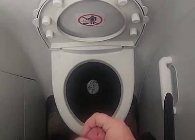 Airplane Bathroom Jerk and Cum.