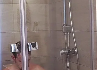 After a Full Day on the Road Wet Solo in the Hotel Shower