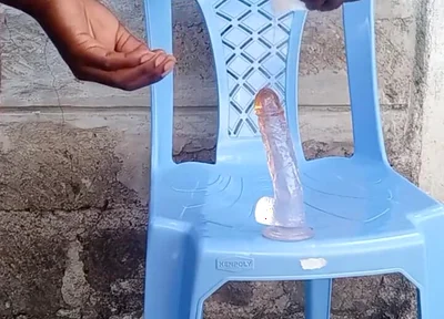 Big Black Ass Bottom Fucking His Asshole with a Dildo Outside