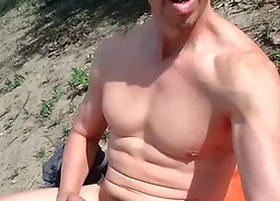 Muscle By A Lake Near People