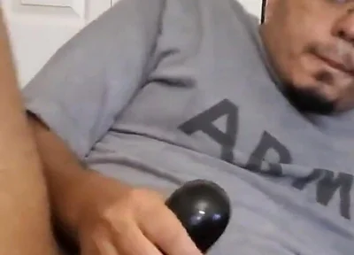 Browndicksavior Using His Oral Sex Toy and Stroking His Brown Cock