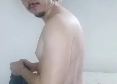 Handsome Guy Folding Laundry Naked