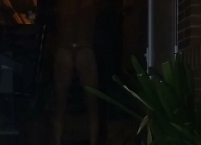 In a Thong Rubbing My Ass on the Terrace