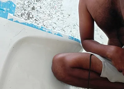 Washing the Bathroom in Xhard Village