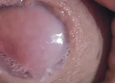 Close-up of Glans Ejaculating Intensely Before Cumming.