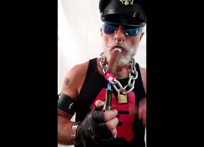 Leather Stepdad Lighting a Big Ring
