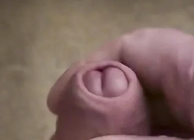 My Friend Sits in a Chair and Jerks off His Cock While Watching Video
