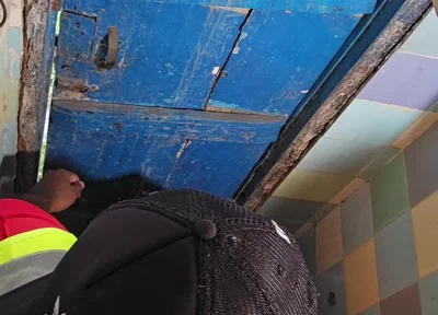 Two Construction Workers Making Out in the Company Bathroom.