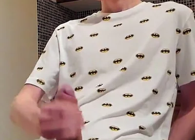 Sweet load of cum flows from this cute guy's big cock