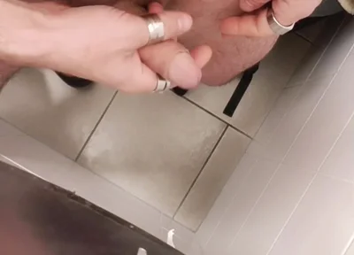 Jerking off a Cock in a Public Toilet